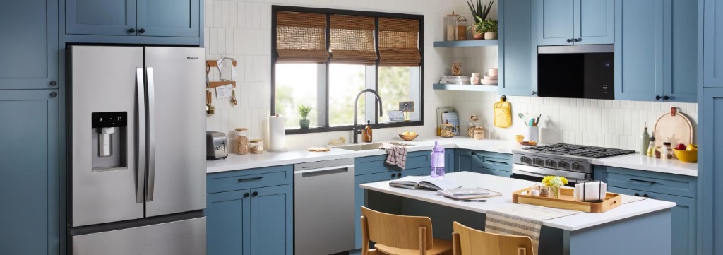 Whirlpool stainless steel kitchen appliances in a modern home